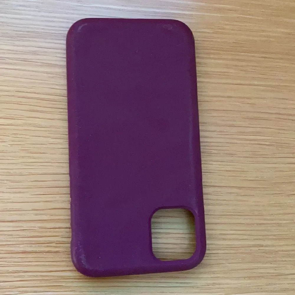 Various IPhone 11 cases including wallflower case